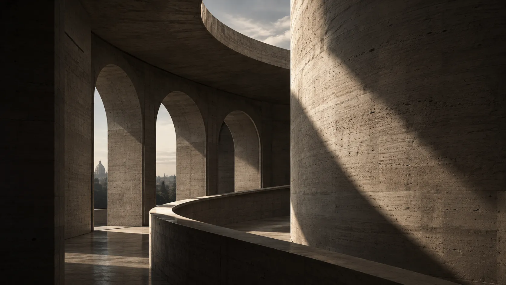 Curved concrete balcony with arched openings overlooking a hillside city.